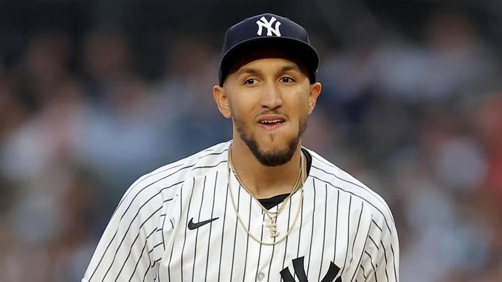 New York Yankees starting pitcher Elmer Rodriguez (71) reacts during the first inning against the Texas Rangers at Yankee Stadium. New York Yankees starting pitcher Elmer Rodriguez (71) reacts during the first inning against the Texas Rangers at Yankee Stadium.