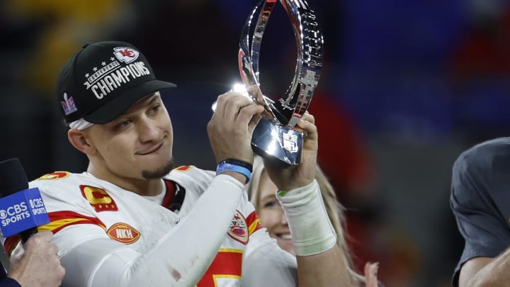 Jan 28, 2024; Baltimore, Maryland, USA; Kansas City Chiefs quarterback Patrick Mahomes (15) celebrates with the Lamar Hunt trophy after the Chiefs' game against the Baltimore Ravens in the AFC Championship football game at M&T Bank Stadium. Mandatory Credit: Geoff Burke-USA TODAY Sports