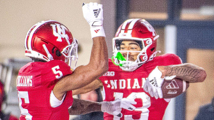 Indiana's Elijah Sarratt (13) celebrates with Ke'Shawn Williams (5) against Purdue at Memorial Stadium. Indiana's Elijah Sarratt (13) celebrates with Ke'Shawn Williams (5) against Purdue at Memorial Stadium.