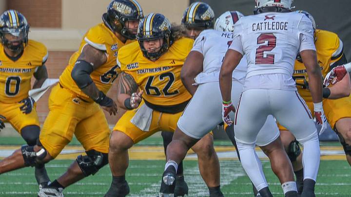 Southern Miss offensive lineman Aloali'i Maui (#62) in action during the Golden Eagles' game against Troy on Nov. 29, 2026. Southern Miss offensive lineman Aloali'i Maui (#62) in action during the Golden Eagles' game against Troy on Nov. 29, 2026.