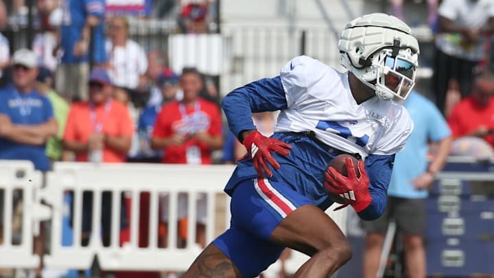 Bills wide receiver Marquez Valdes-Scantling pulls in a pass and races upfield during route drills. Bills wide receiver Marquez Valdes-Scantling pulls in a pass and races upfield during route drills.