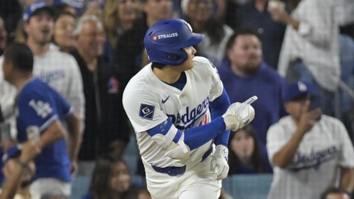 Oct 17, 2025; Los Angeles, California, USA; Los Angeles Dodgers two-way player Shohei Ohtani (17) reacts to his solo home run against the Milwaukee Brewers during the seventh inning of game four of the NLCS round for the 2025 MLB playoffs at Dodger Stadium. Mandatory Credit: Jayne Kamin-Oncea-Imagn Images