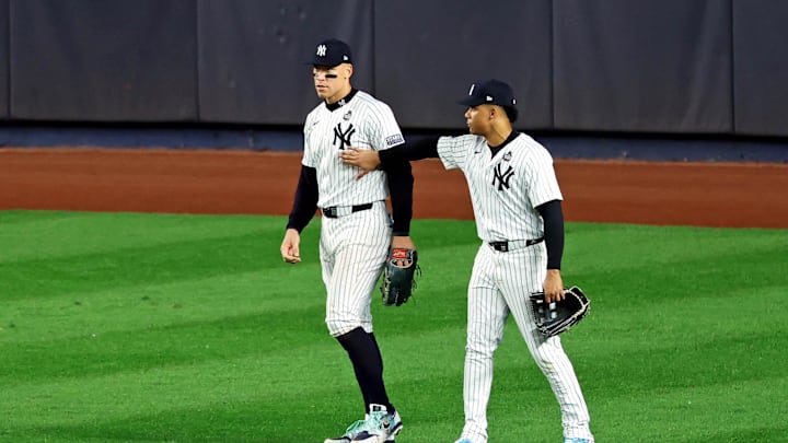 Oct 30, 2024; Bronx, New York, USA; New York Yankees outfielder Juan Soto (22) reacts with outfielder Aaron Judge (99) after Judge dropped a fly ball during the fifth inning against the Los Angeles Dodgers during game five of the 2024 MLB World Series at Yankee Stadium. Mandatory Credit: James Lang-Imagn Images Oct 30, 2024; Bronx, New York, USA; New York Yankees outfielder Juan Soto (22) reacts with outfielder Aaron Judge (99) after Judge dropped a fly ball during the fifth inning against the Los Angeles Dodgers during game five of the 2024 MLB World Series at Yankee Stadium. Mandatory Credit: James Lang-Imagn Images