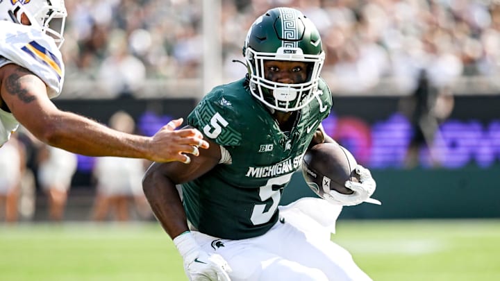 Michigan State's Nathan Carter runs for a gain against Prairie View A&M during the first quarter on Saturday, Sept. 14, 2024, at Spartan Stadium in East Lansing.