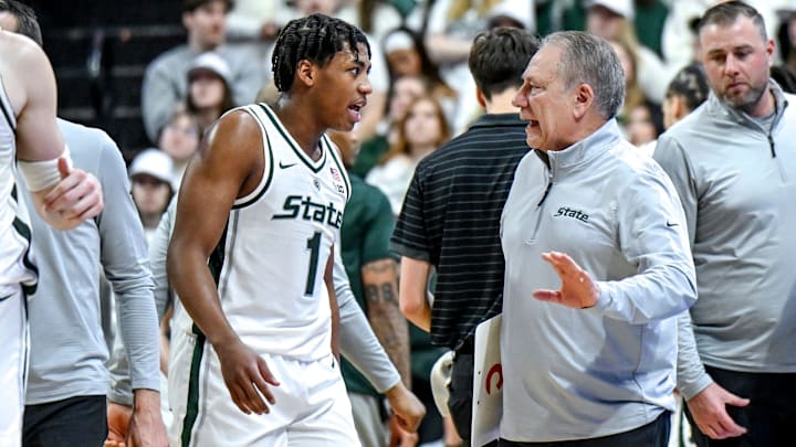 Michigan State's head coach Tom Izzo, right, talks with Jeremy Fears Jr. during the first half in the game against Maryland on Saturday, Jan. 24, 2026, at the Breslin Center in East Lansing.