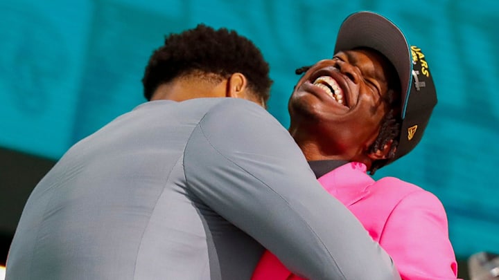 Wide receiver and cornerback Travis Hunter hugs Jacksonville Jaguars defensive lineman Arik Armstead after the Jaguars select Hunter second overall during the first round of the 2025 NFL Draft on Thursday, April 24, 2025, at Lambeau Field in Green Bay, Wisconsin. The draft runs through April 26.
Tork Mason/USA TODAY NETWORK-Wisconsin