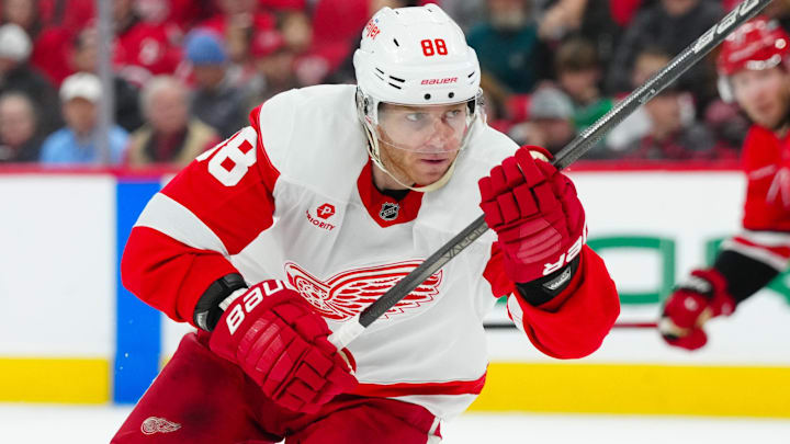 Mar 14, 2025; Raleigh, North Carolina, USA;  Detroit Red Wings right wing Patrick Kane (88) skates against the Carolina Hurricanes during the second period at Lenovo Center. Mandatory Credit: James Guillory-Imagn Images