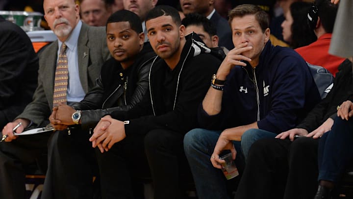 Nov 30, 2014; Los Angeles, CA, USA; Recording artist Drake watches the game between the Los Angeles Lakers and the Toronto Raptors at Staples Center. Lakers won 129-122 in overtime. Mandatory Credit: Jayne Kamin-Oncea-Imagn Images