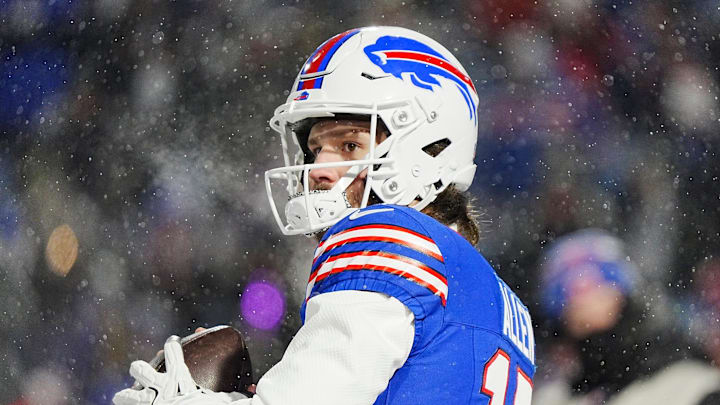 Buffalo Bills quarterback Josh Allen throws a pass, warming up before the Buffalo Bills divisional game against the Baltimore Ravens at Highmark Stadium in Orchard Park on Jan. 19, 2025.