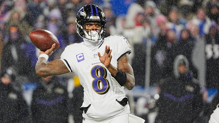 Baltimore Ravens quarterback Lamar Jackson gets off a pass during first half action during the Buffalo Bills divisional game against the Baltimore Ravens at Highmark Stadium in Orchard Park on Jan. 19, 2025.