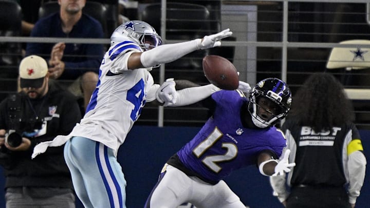 Aug 16, 2025; Arlington, Texas, USA; Dallas Cowboys cornerback Zion Childress (48) breaks up a pass intended for Baltimore Ravens wide receiver Malik Cunningham (12) during the second half at AT&T Stadium. Mandatory Credit: Jerome Miron-Imagn Images