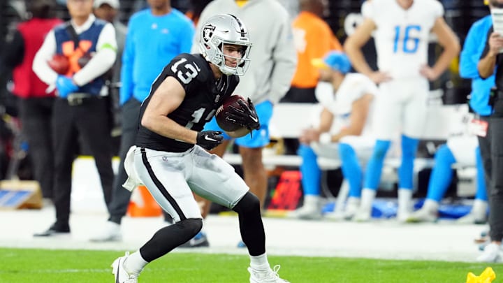 Dec 14, 2023; Paradise, Nevada, USA; Las Vegas Raiders wide receiver Hunter Renfrow (13) runs against the Los Angeles Chargers in the first quarter at Allegiant Stadium. Mandatory Credit: Stephen R. Sylvanie-Imagn Images Dec 14, 2023; Paradise, Nevada, USA; Las Vegas Raiders wide receiver Hunter Renfrow (13) runs against the Los Angeles Chargers in the first quarter at Allegiant Stadium. Mandatory Credit: Stephen R. Sylvanie-Imagn Images