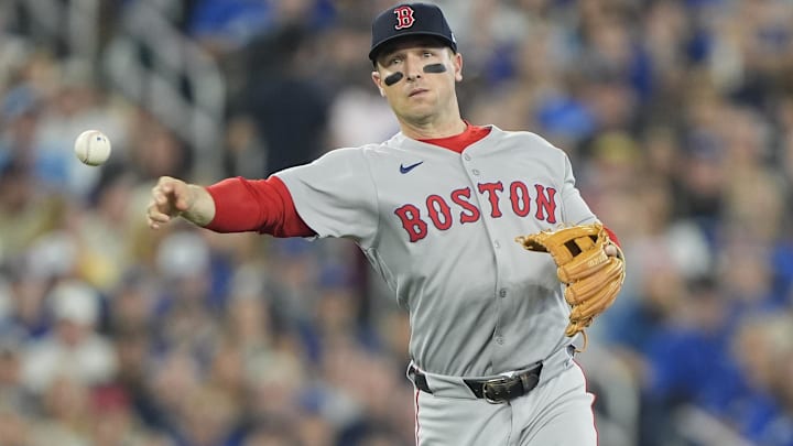Sep 25, 2025; Toronto, Ontario, CAN; Boston Red Sox third baseman Alex Bregman (2) throws out Toronto Blue Jays catcher Tyler Heineman (not pictured) at first base during the third inning at Rogers Centre. Sep 25, 2025; Toronto, Ontario, CAN; Boston Red Sox third baseman Alex Bregman (2) throws out Toronto Blue Jays catcher Tyler Heineman (not pictured) at first base during the third inning at Rogers Centre.