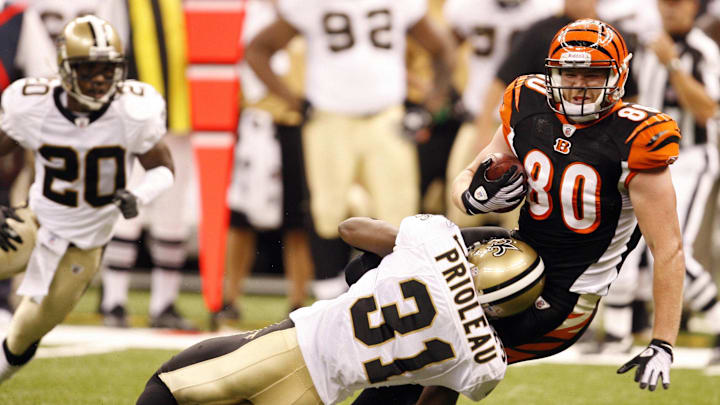 August, 14, 2009; New Orleans, LA, USA; New Orleans safety Pierson Prioleau (31) tackles Cincinnati tight end Chase Coffman (80) during the preseason game at the Louisiana Superdome.