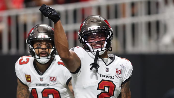 Sep 7, 2025; Atlanta, Georgia, USA; Tampa Bay Buccaneers wide receiver Emeka Egbuka (2) reacts after scoring a touchdown against the Atlanta Falcons during the second quarter at Mercedes-Benz Stadium. Mandatory Credit: Brett Davis-Imagn Images