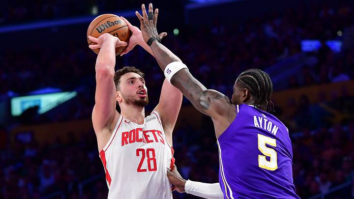 Apr 29, 2026; Los Angeles, California, USA; Houston Rockets center Alperen Sengun (28) shoots against Los Angeles Lakers center Deandre Ayton (5) during the second half in game five of the first round of the 2026 NBA Playoffs at Crypto.com Arena. Mandatory Credit: Gary A. Vasquez-Imagn Images