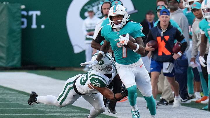 Miami Dolphins wide receiver Caleb Douglas (7) stays in bounds and avoids New York Jets safety Minkah Fitzpatrick (29) for a touchdown reception during the second half at MetLife Stadium in Week 7.