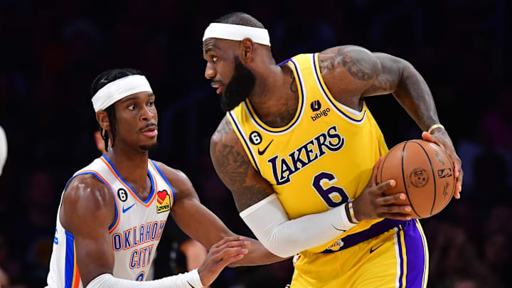 Oklahoma City Thunder guard Shai Gilgeous-Alexander defends against Los Angeles Lakers forward LeBron James Oklahoma City Thunder guard Shai Gilgeous-Alexander defends against Los Angeles Lakers forward LeBron James