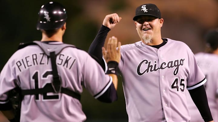 Chicago White Sox catcher A.J. Pierzynski (12) and closer Bobby Jenks (45) celebrate the White Sox 6-1 victory against the Los Angeles Angels at Angel Stadium of Anaheim.