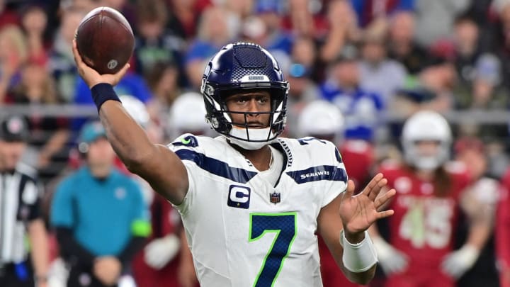 Jan 7, 2024; Glendale, Arizona, USA; Seattle Seahawks quarterback Geno Smith (7) throws in the second half against the Arizona Cardinals at State Farm Stadium. Mandatory Credit: Matt Kartozian-USA TODAY Sports