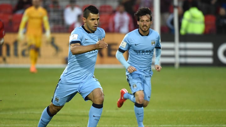May 27, 2015; Toronto, Ontario, Canada; Manchester City forward Sergio Aguero (16) advances the ball upfield alongside midfielder David Silva (21) during the second half of an international club friendly at BMO Field against Toronto FD. Manchester City won 1-0.  Mandatory Credit: Dan Hamilton-Imagn Images