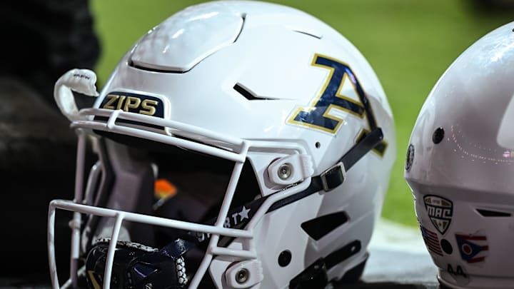 Sep 17, 2022; Knoxville, Tennessee, USA; Akron Zips helmets sit on the sidelines in the game against the Tennessee Volunteers at Neyland Stadium.
