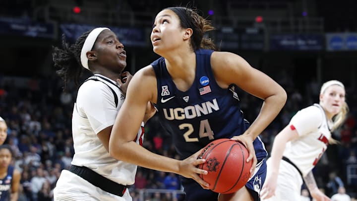 Mar 31, 2019; Albany , NY, USA; UConn Huskies forward Napheesa Collier (24) drives to the basket against Louisville Cardinals forward Bionca Dunham (left) during the second half in the championship game of the Albany regional in the women's 2019 NCAA Tournament at Times Union Center. Mandatory Credit: Rich Barnes-Imagn Images Mar 31, 2019; Albany , NY, USA; UConn Huskies forward Napheesa Collier (24) drives to the basket against Louisville Cardinals forward Bionca Dunham (left) during the second half in the championship game of the Albany regional in the women's 2019 NCAA Tournament at Times Union Center. Mandatory Credit: Rich Barnes-Imagn Images