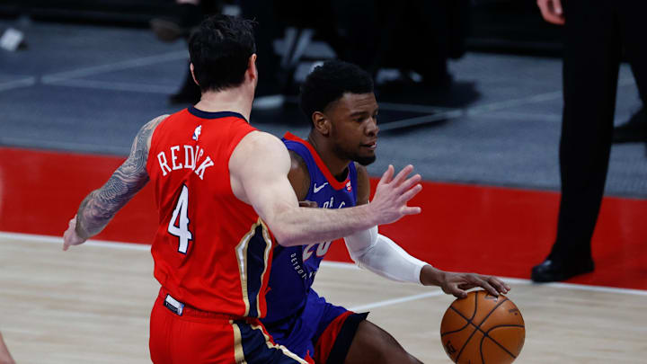 Feb 14, 2021; Detroit, Michigan, USA;  Detroit Pistons guard Josh Jackson (20) dribbles on New