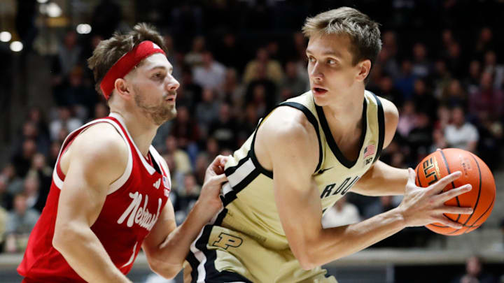 Nebraska Cornhuskers guard Sam Hoiberg (1) defends Purdue Boilermakers forward Brian Waddell (11) 