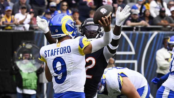 Darrell Taylor gets in the face of Matthew Stafford to force an interception by Jaquan Brisker, sealing the Bears' win.