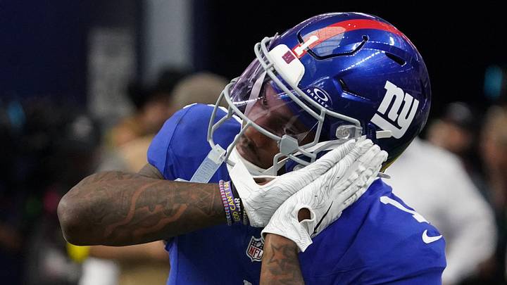 Sep 14, 2025; Arlington, Texas, USA; New York Giants wide receiver Malik Nabers (1) reacts after scoring a touchdown during the fourth quarter at AT&T Stadium. Mandatory Credit: Raymond Carlin III-Imagn Images
