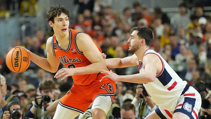 Apr 4, 2026; Indianapolis, IN, USA; Illinois Fighting Illini forward David Mirkovic (0) is defended by Connecticut Huskies forward Alex Karaban (11) in the first half during a semifinal of the Final Four of the men's 2026 NCAA Tournament at Lucas Oil Stadium. Mandatory Credit: Robert Deutsch-Imagn Images Apr 4, 2026; Indianapolis, IN, USA; Illinois Fighting Illini forward David Mirkovic (0) is defended by Connecticut Huskies forward Alex Karaban (11) in the first half during a semifinal of the Final Four of the men's 2026 NCAA Tournament at Lucas Oil Stadium. Mandatory Credit: Robert Deutsch-Imagn Images
