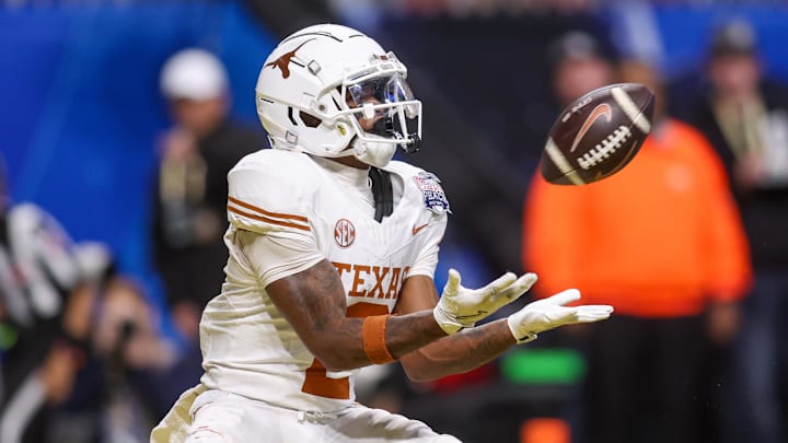 Jan 1, 2025; Atlanta, GA, USA; Texas Longhorns wide receiver Matthew Golden (2) catches a pass for a touchdown against the Arizona State Sun Devils in overtime at Mercedes-Benz Stadium.