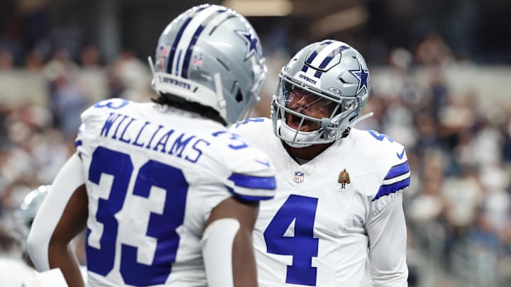 Sep 14, 2025; Arlington, Texas, USA; Dallas Cowboys running back Javonte Williams (33) celebrates with quarterback Dak Prescott (4) after scoring a touchdown against the New York Giants during the third quarter at AT&T Stadium. Sep 14, 2025; Arlington, Texas, USA; Dallas Cowboys running back Javonte Williams (33) celebrates with quarterback Dak Prescott (4) after scoring a touchdown against the New York Giants during the third quarter at AT&T Stadium.