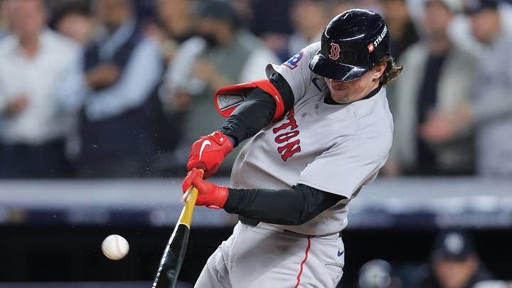 Sep 29, 2026; Bronx, New York, USA; Boston Red Sox catcher Adley Rutschman (31) hits a single during the first inning against the New York Yankees during game one of the Wildcard round for the 2026 MLB Playoffs at Yankee Stadium. Mandatory Credit: Brad Penner-Imagn Images Sep 29, 2026; Bronx, New York, USA; Boston Red Sox catcher Adley Rutschman (31) hits a single during the first inning against the New York Yankees during game one of the Wildcard round for the 2026 MLB Playoffs at Yankee Stadium. Mandatory Credit: Brad Penner-Imagn Images