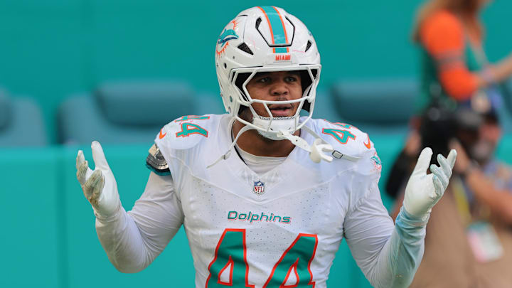 Nov 24, 2024; Miami Gardens, Florida, USA; Miami Dolphins linebacker Chop Robinson (44) reacts after attempting to recover a fumble against the New England Patriots during the second quarter at Hard Rock Stadium.
