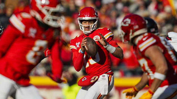 Dec 21, 2024; Kansas City, Missouri, USA; Kansas City Chiefs quarterback Patrick Mahomes (15) drops back to pass during the first half against the Houston Texans at GEHA Field at Arrowhead Stadium. Mandatory Credit: Jay Biggerstaff-Imagn Images