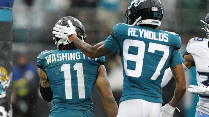 Jacksonville Jaguars wide receiver Parker Washington (11) and wide receiver Josh Reynolds (87) celebrate a touchdown Jacksonville Jaguars wide receiver Parker Washington (11) and wide receiver Josh Reynolds (87) celebrate a touchdown