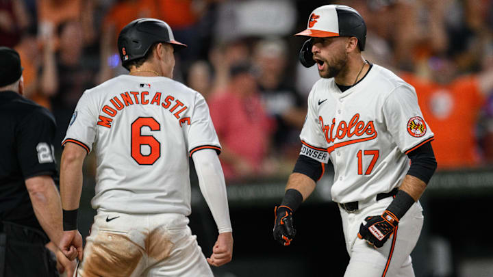 Jun 12, 2024; Baltimore, Maryland, USA; Baltimore Orioles outfielder Colton Cowser (17) celebrates with first base Ryan Mountcastle (6) after hitting a home run during the eighth inning against the Atlanta Braves at Oriole Park at Camden Yards.