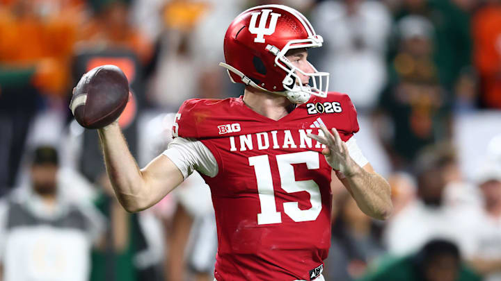 Jan 19, 2026; Miami Gardens, FL, USA; Indiana Hoosiers quarterback Fernando Mendoza (15) drops back to pass against the Miami Hurricanes in the first half during the College Football Playoff National Championship game at Hard Rock Stadium.