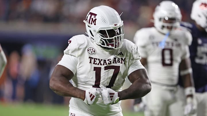Texas A&M Aggies defensive lineman Albert Regis (17) reacts after making a tackle against the Auburn Tigers in the third quarter at Jordan-Hare Stadium. 