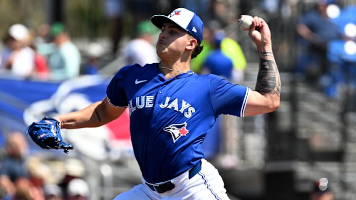 Mar 15, 2024; Dunedin, Florida, USA; Toronto Blue Jays starting pitcher Ricky Tiedemann (70) delivers a pitch in the first inning of a spring training game against the Detroit Tigers at TD Ballpark. Mandatory Credit: Jonathan Dyer-Imagn Images