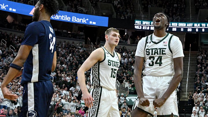 Jan 15, 2025; East Lansing, Michigan, USA;  Michigan State Spartans forward Xavier Booker (34) celebrates a basket and foul against the Penn State Nittany Lions during the second half at Jack Breslin Student Events Center. Mandatory Credit: Dale Young-Imagn Images