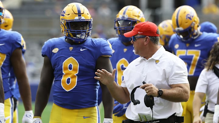Sep 25, 2021; Pittsburgh, Pennsylvania, USA; Pittsburgh Panthers assistant head coach Charlie Partridge (right) talks with defensive lineman Calijah Kancey (8) against the New Hampshire Wildcats during the first quarter at Heinz Field. Mandatory Credit: Charles LeClaire-Imagn Images Sep 25, 2021; Pittsburgh, Pennsylvania, USA; Pittsburgh Panthers assistant head coach Charlie Partridge (right) talks with defensive lineman Calijah Kancey (8) against the New Hampshire Wildcats during the first quarter at Heinz Field. Mandatory Credit: Charles LeClaire-Imagn Images