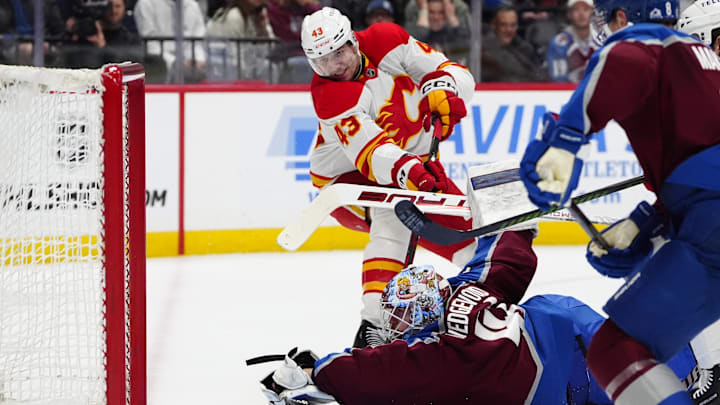 Mar 31, 2025; Denver, Colorado, USA; Calgary Flames right wing Adam Klapka (43) shoots the puck at Colorado Avalanche goaltender Scott Wedgewood (41) in the third period at Ball Arena. Mandatory Credit: Ron Chenoy-Imagn Images Mar 31, 2025; Denver, Colorado, USA; Calgary Flames right wing Adam Klapka (43) shoots the puck at Colorado Avalanche goaltender Scott Wedgewood (41) in the third period at Ball Arena. Mandatory Credit: Ron Chenoy-Imagn Images