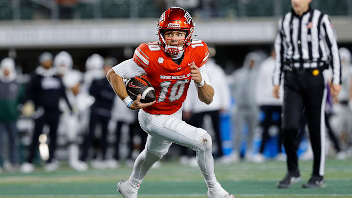 UNLV Rebels quarterback Anthony Colandrea (10) scrambles and runs for a touchdown in the third quarter against the Colorado State Rams at Sonny Lubick Field at Canvas Stadium. Mandatory Credit: Isaiah J. Downing-Imagn Images