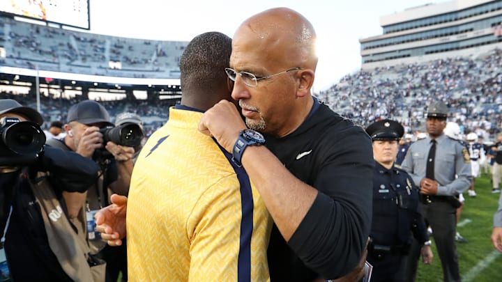 Penn State coach James Franklin (right) hugs Kent State Golden Flashes head coach Kenni Burns following the game at Beaver Stadium.