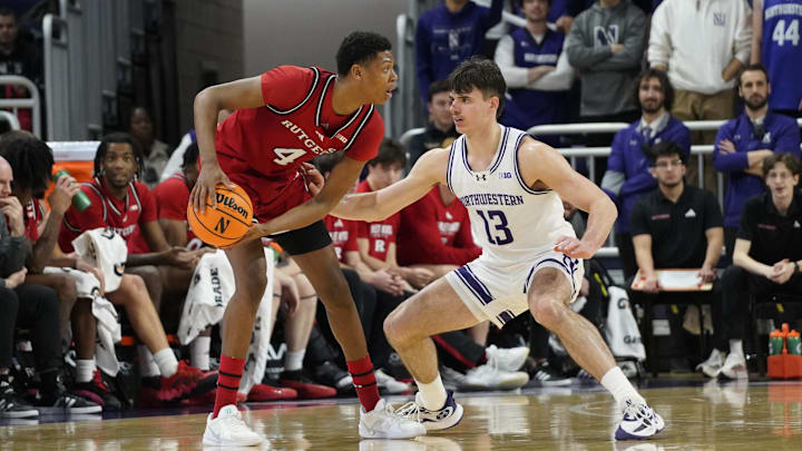 Jan 29, 2025; Evanston, Illinois, USA;Northwestern Wildcats guard Brooks Barnhizer (13) defends Rutgers Scarlet Knights guard Ace Bailey (4) during the second half at Welsh-Ryan Arena. Mandatory Credit: David Banks-Imagn Images