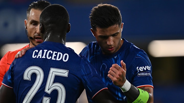 Moises Caicedo gives captain's armband to Enzo Fernandez during the Conference League play-off match between Chelsea and Servette.