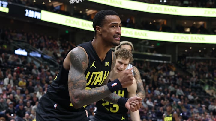 Mar 27, 2024; Salt Lake City, Utah, USA; Utah Jazz forward John Collins (20) reacts to a call against the San Antonio Spurs during the first quarter at Delta Center. Mandatory Credit: Rob Gray-Imagn Images